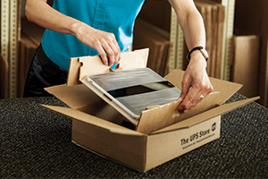 Associate packing a tablet